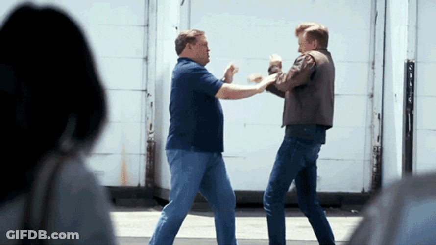Slap Fight Conan O'Brien GIF