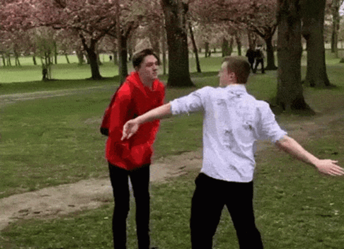 Slapping Schoolboy At Park GIF