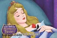 Sleeping Beauty Aurora Lying With Rose In Chest GIF