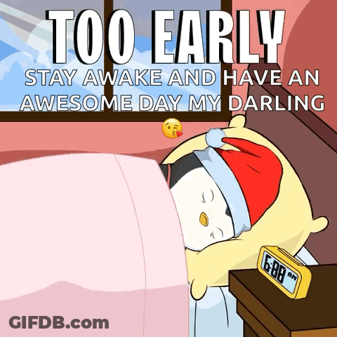 Sleeping Cat Next To Alarm Clock GIF