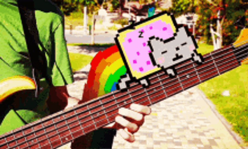 Sleeping Nyan Cat With Guitar Music GIF