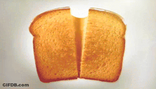 Slice Of Bread Cut In Half With Hole In Middle GIF