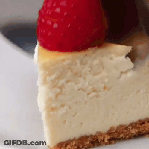 Slice Of Cheesecake With Raspberry GIF