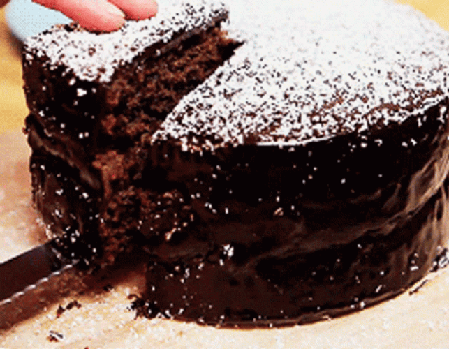 Slicing A Round Chocolate Cake GIF