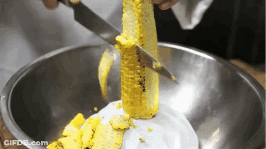 Slicing Corn In Stainless Steel Bowl GIF