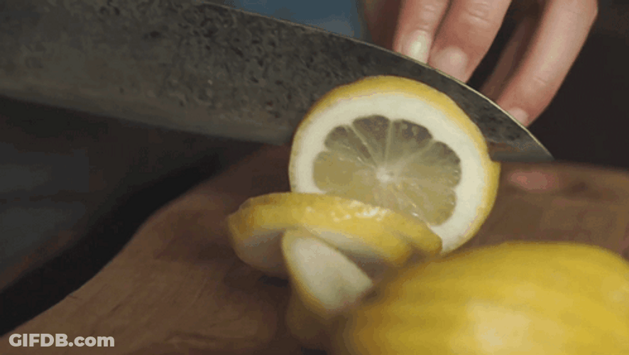 Slicing Thin Lemon GIF