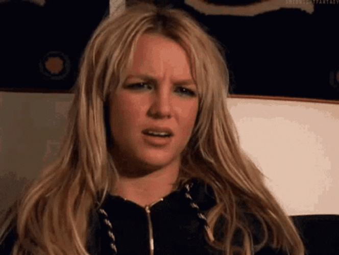 Slow Blink Britney Spears Frowned Face GIF