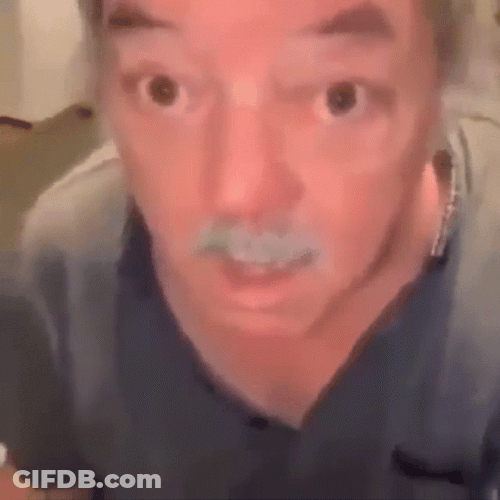 Slow Blinking Drowsy Man Startled GIF