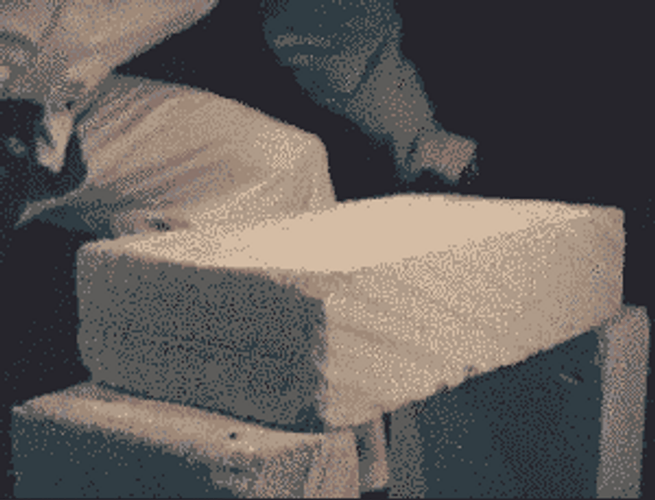 Slow Motion Hollow Block Break Using Karate Chop GIF