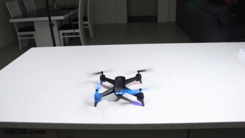Small Black Drone On Counter GIF