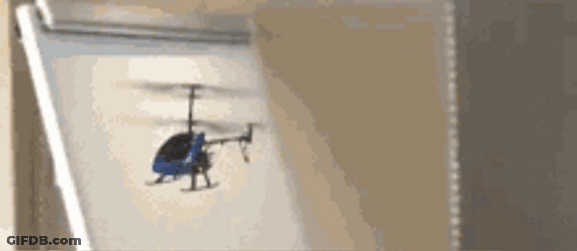 Small Blue Helicopter Rotating Fly GIF
