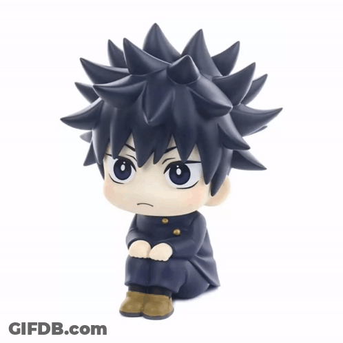 Small Figurine Of Boy With Spiky Hair GIF