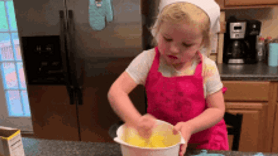 Small Girl Cooking GIF