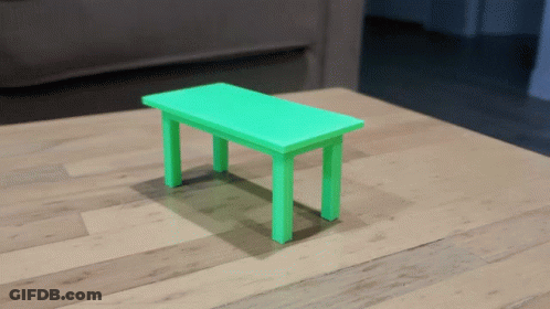 Small Green Table On Wooden Table GIF