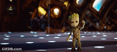 Small Groot Figurine From Guardians Of The Galaxy Standing In Room GIF