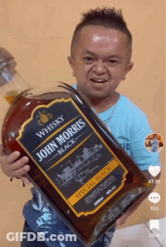 Small Man Holding John Morris Whisky GIF