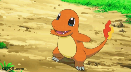 Small Orange Pokemon With Red Tail On Dirt Path GIF