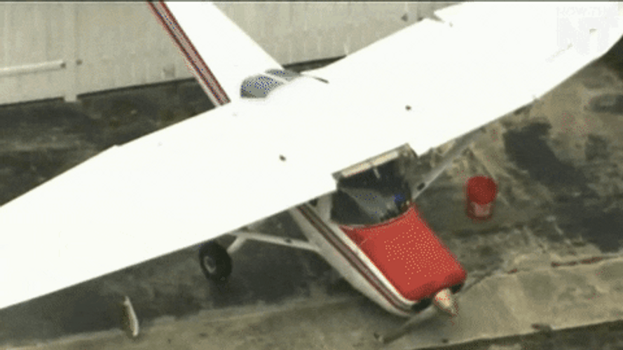 Small Plane Backyard Crash GIF