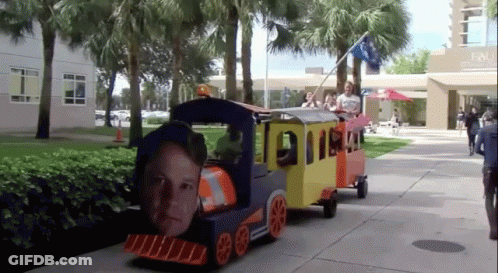 Small Train With Man On Front GIF