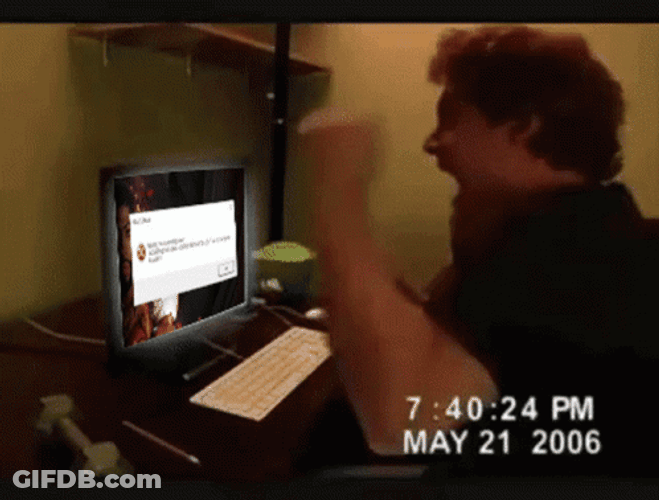 Smashing Computer Guy Punching Screen GIF