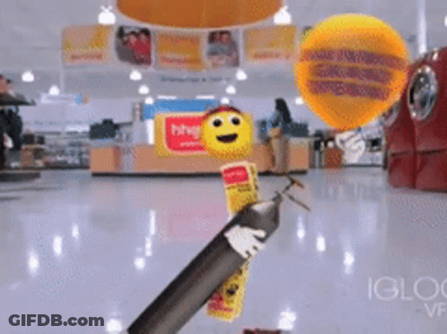 Smiley Cartoon Character Holding Fire Extinguisher GIF