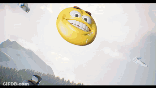 Smiley Face Flying Over Mountains GIF