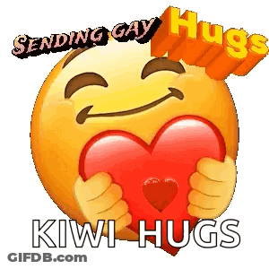 Smiley Face Holding Red Heart Sending Gay Hugs GIF