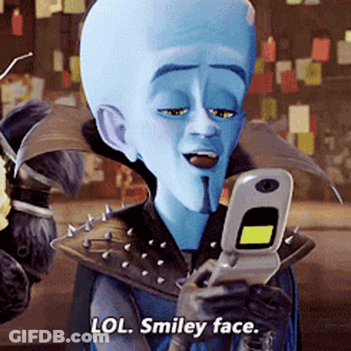 Smiley Face Saying Lol Holding Cell Phone GIF