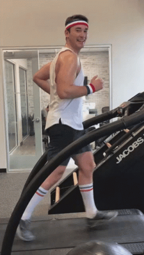 Smiling And Running On Treadmill GIF