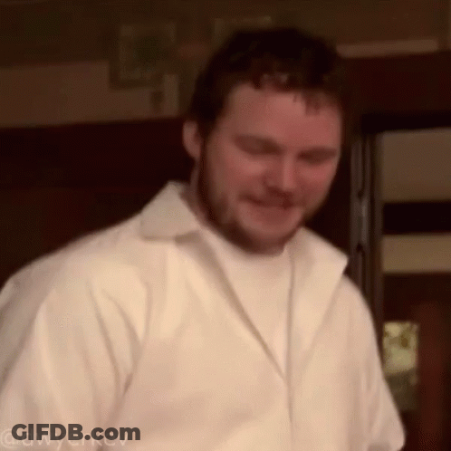 Smiling Bearded Man In White Shirt And Jacket GIF