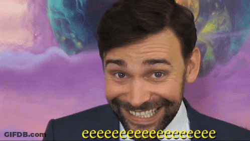 Smiling Bearded Man On Purple Background Saying Eeeee GIF