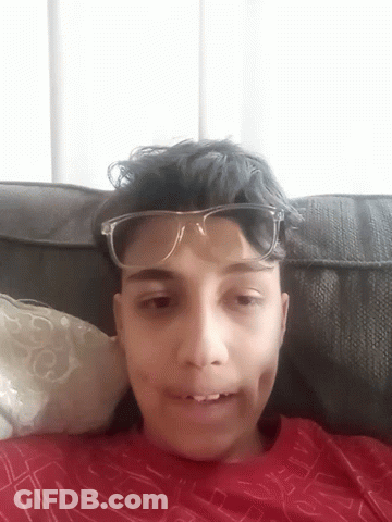 Smiling Boy In Glasses And Red S Shirt GIF