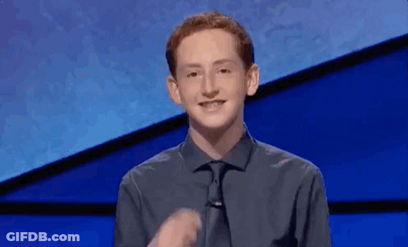 Smiling Boy Pointing GIF