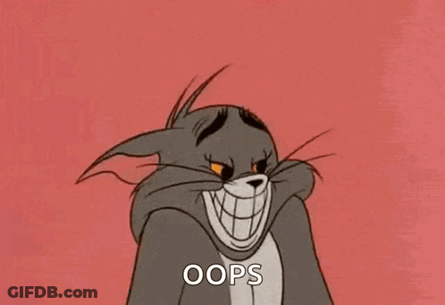 Smiling Cartoon Cat Saying Oops GIF