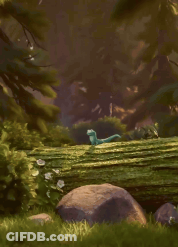 Smiling Cartoon Lizard On Mossy Rock GIF