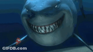 Smiling Cartoon Shark With Fish GIF