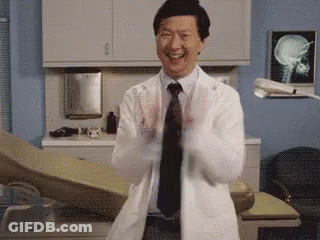 Smiling Doctor In Lab Coat Clapping GIF