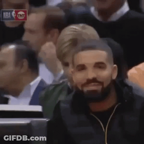 Smiling Drake Pointing GIF