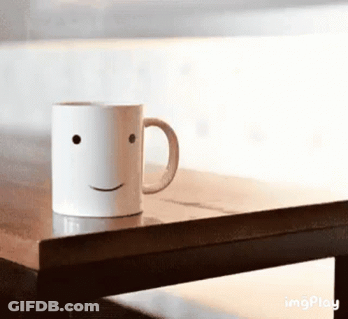 Smiling Face Coffee Mug GIF