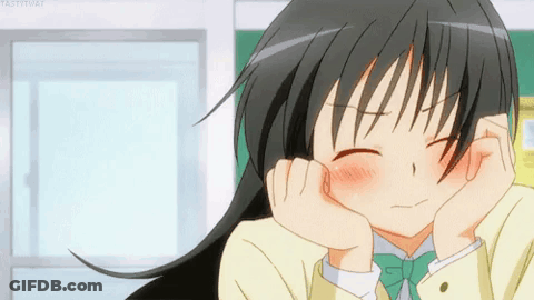 Smiling Girl With Long Black Hair And Green Bow Tie GIF
