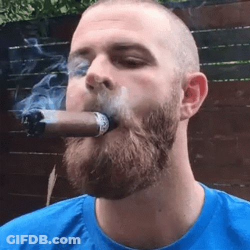 Smiling Guy While Smoking Cigar GIF