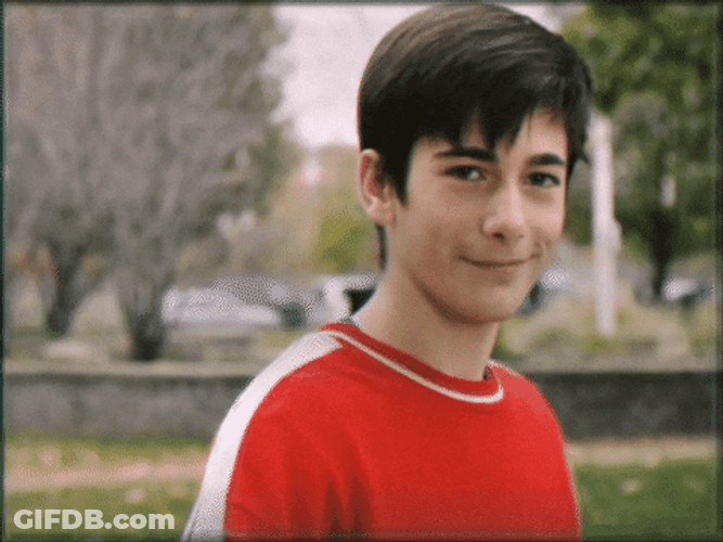 Smiling Kid Thumbs Up GIF