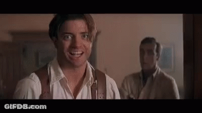 Smiling Man And Man Looking At Camera GIF