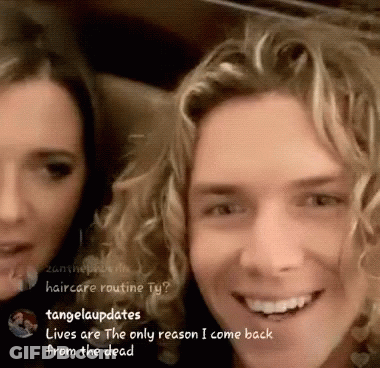 Smiling Man And Woman With Tangelaupdates GIF