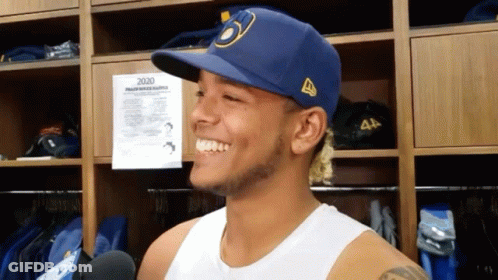 Smiling Man Blue Hat White Tank Top GIF