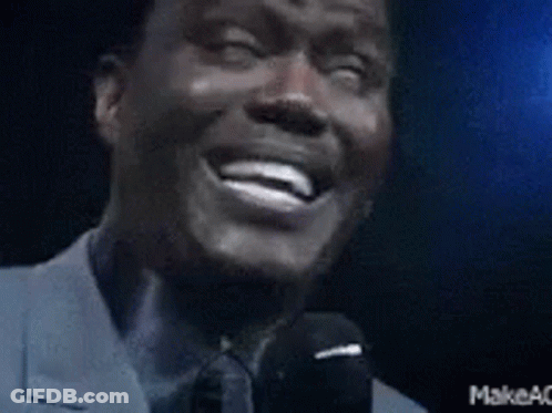 Smiling Man Holding Microphone GIF