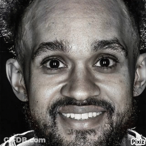 Smiling Man In Black And White GIF