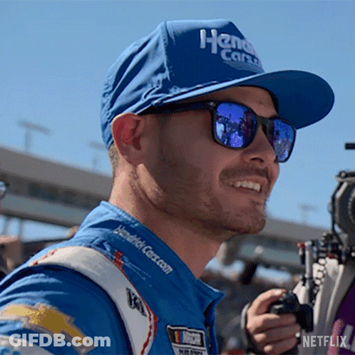 Smiling Man In Blue Hat Sunglasses Holding Camera GIF