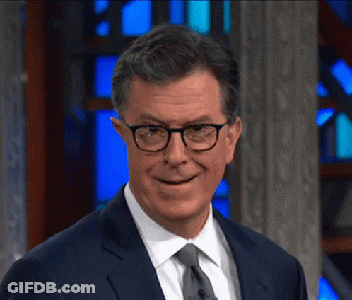 Smiling Man In Glasses And Suit GIF