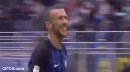 Smiling Man In Soccer Uniform GIF